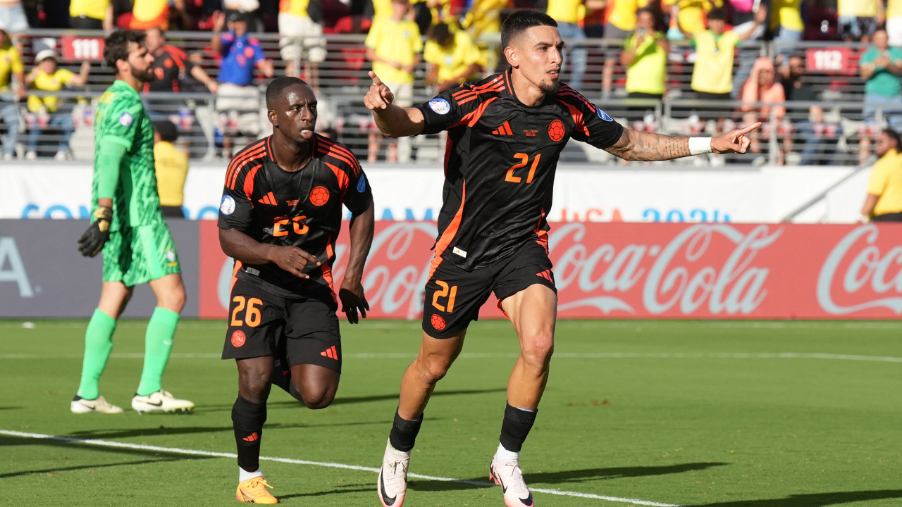 Daniel Muñoz junto a Deiver Machado